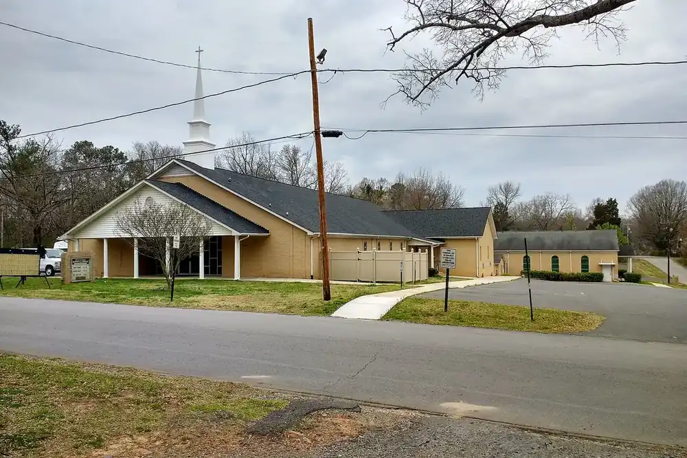 Boyd Hill Baptist Church and its white steeple beside a quiet street in Rock Hill, South Carolina
